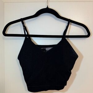 Size 8 black Primark tank top with built in sports bra.